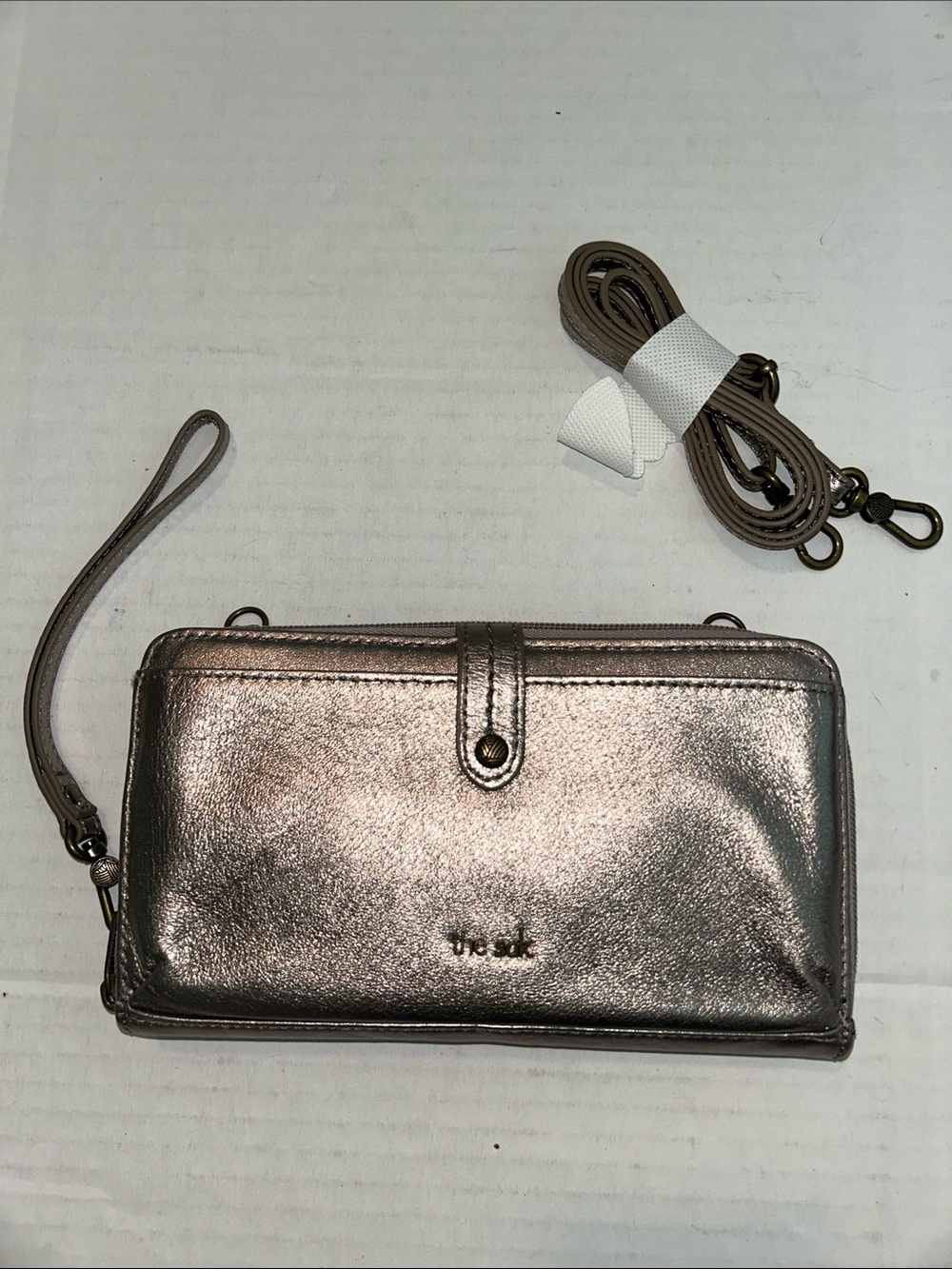 The Sak Iris smartphone wallet metallic pyrite leather wristlet crossbody
